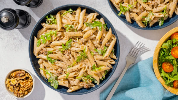 Penne with Herbs, Arugula, Walnuts and Goat Cheese